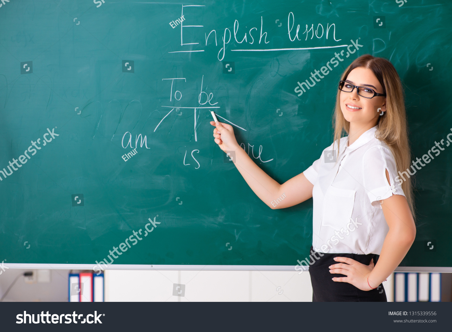 Young Female English Language Teacher Standing Stock Photo 1315339556 ...