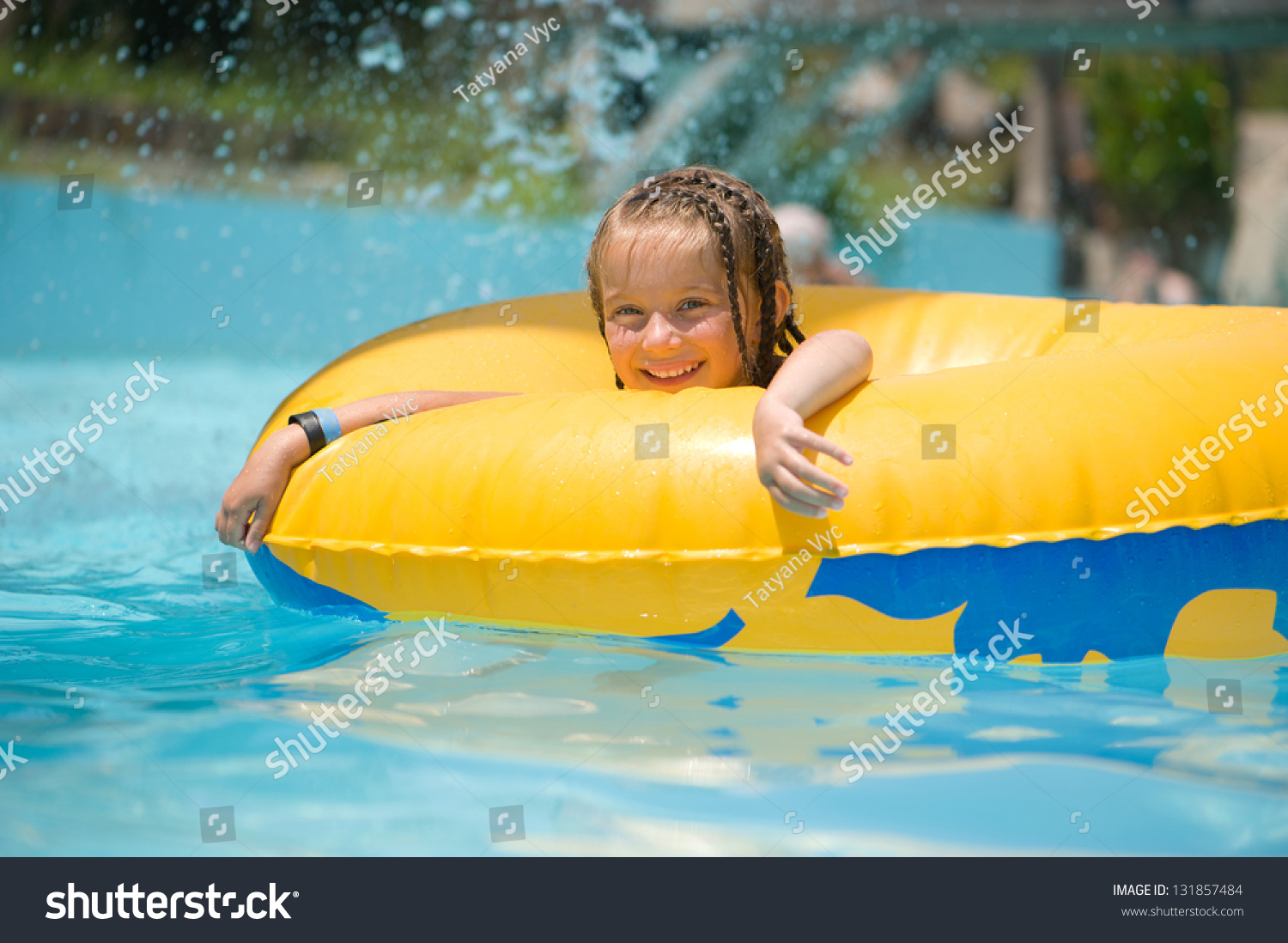 Little Girl On Inflatable Ring Swimming Stock Photo 131857484 ...