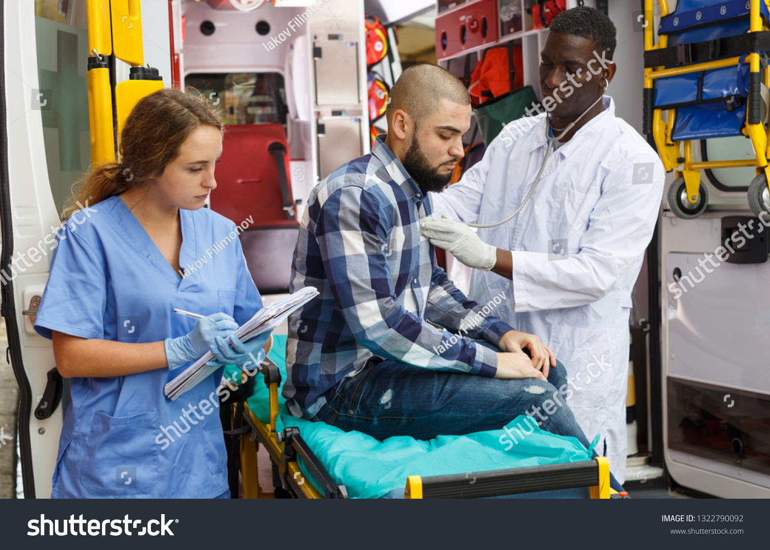 Paramedic Team Providing First Aid Man Stock Photo 1322790092 ...