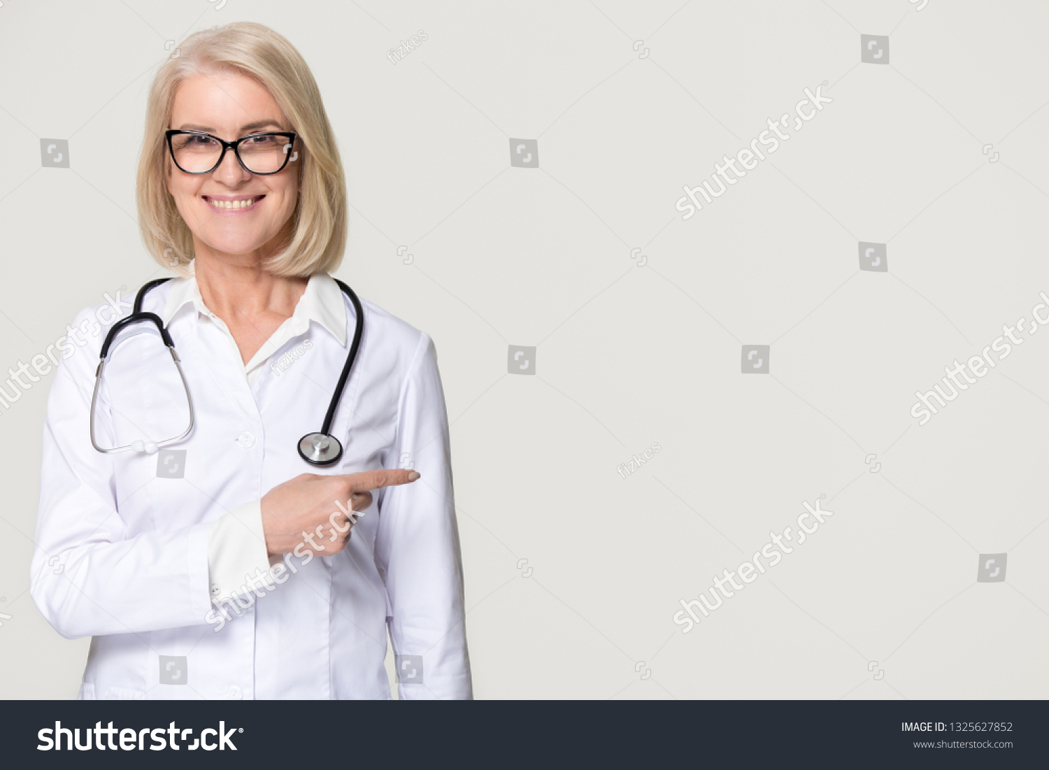Smiling Mature Woman Doctor Stethoscope