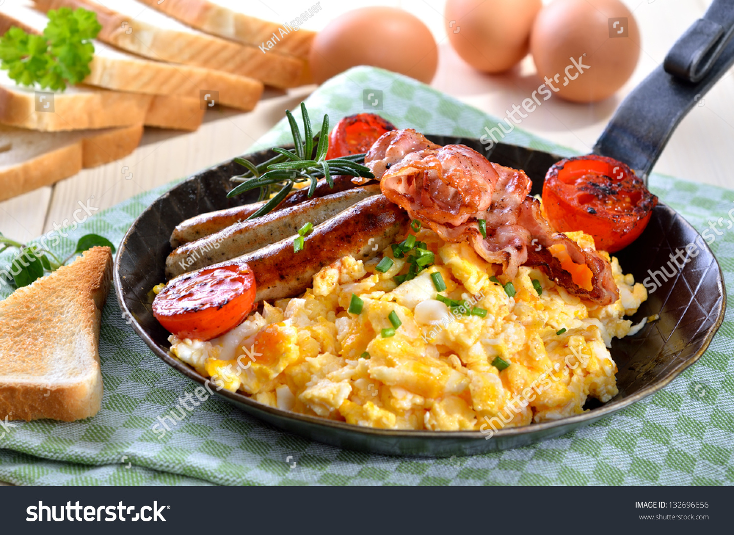 scrambled eggs and bacon and sausage