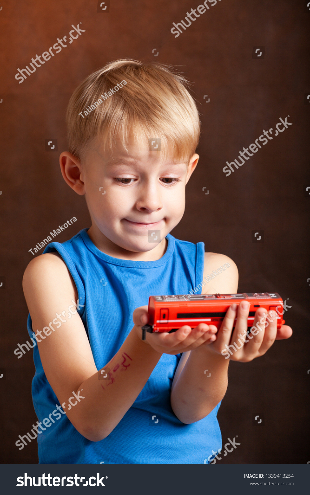 Boy Holding Toy Car Locomotive Concept Stock Photo 1339413254 ...