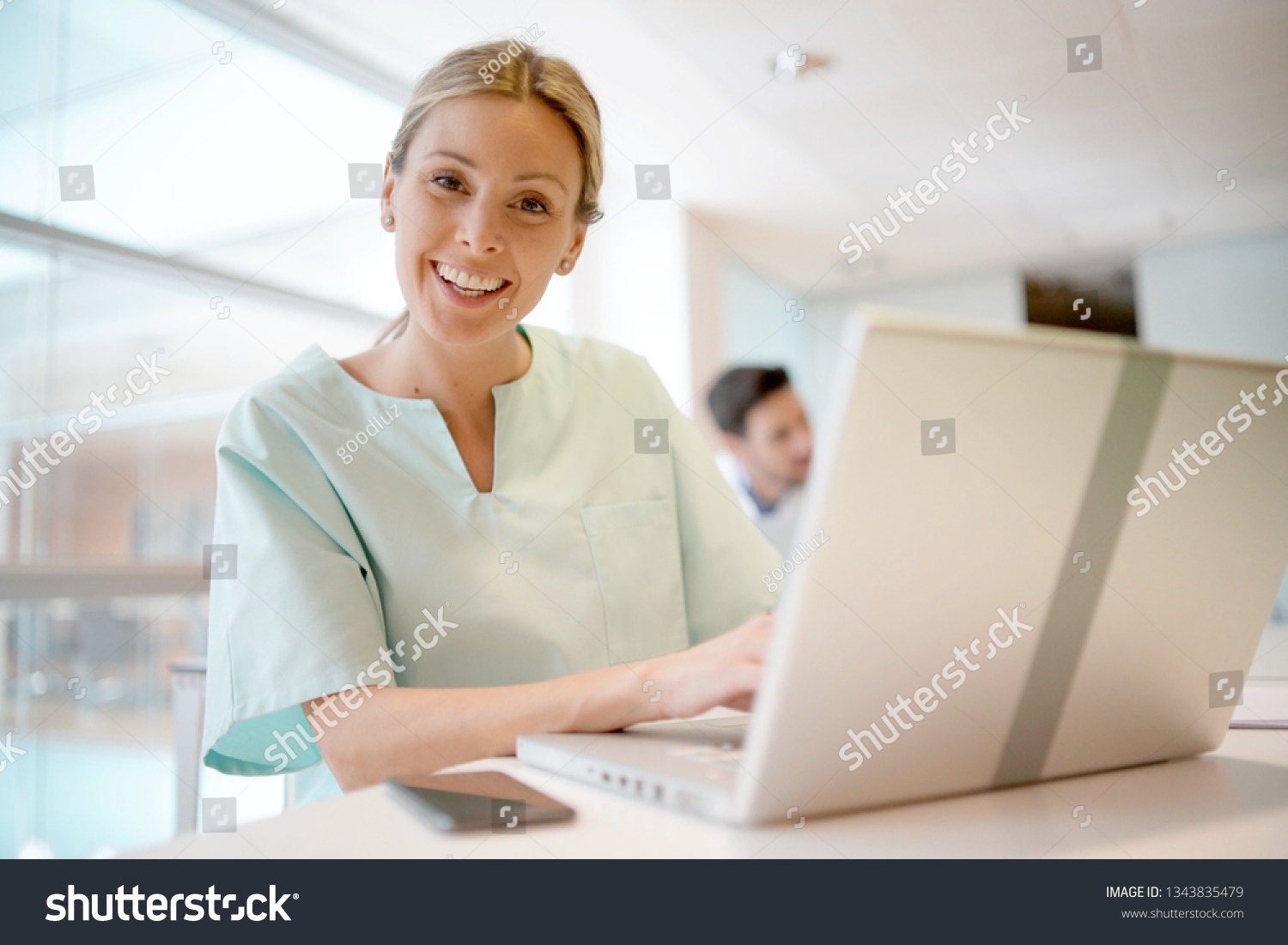 Nurse Smiling Camera Hospital Office Stock Photo 1343835479 | Shutterstock