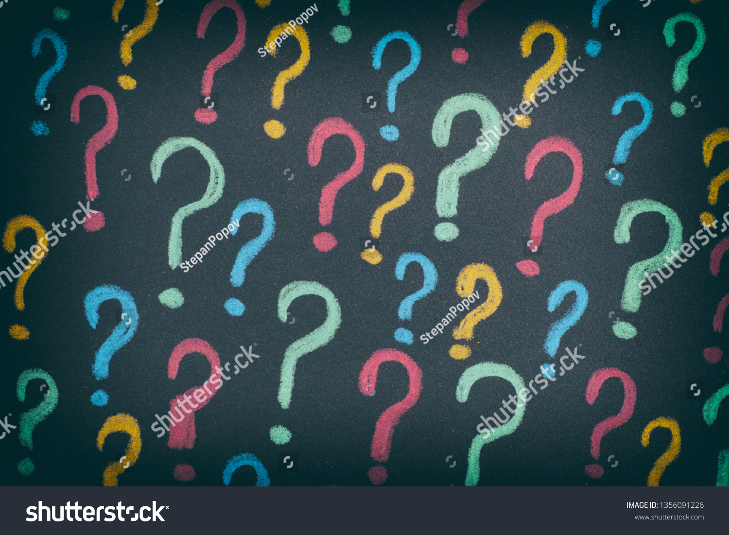 Colorful Question Marks On Black Background Stock Photo