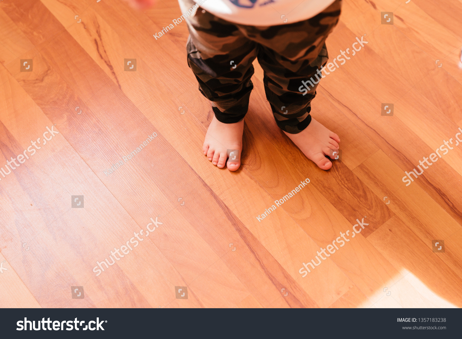 baby-feet-on-floor-stock-photo-1357183238-shutterstock