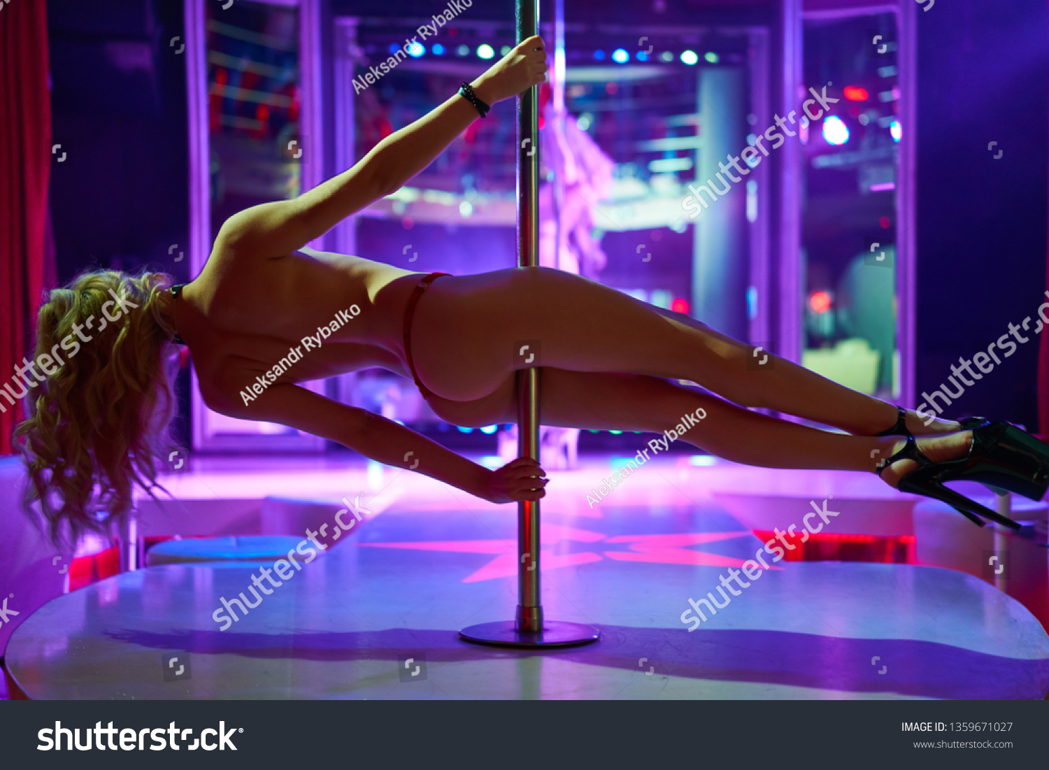 Young Sexy Woman Pole Dancing picture