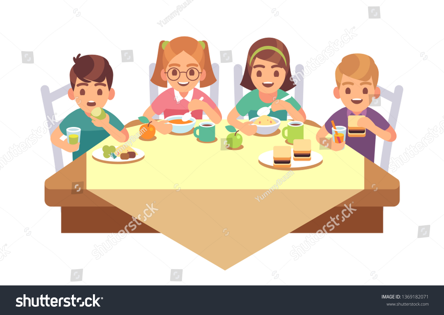 Дети за столом обедают