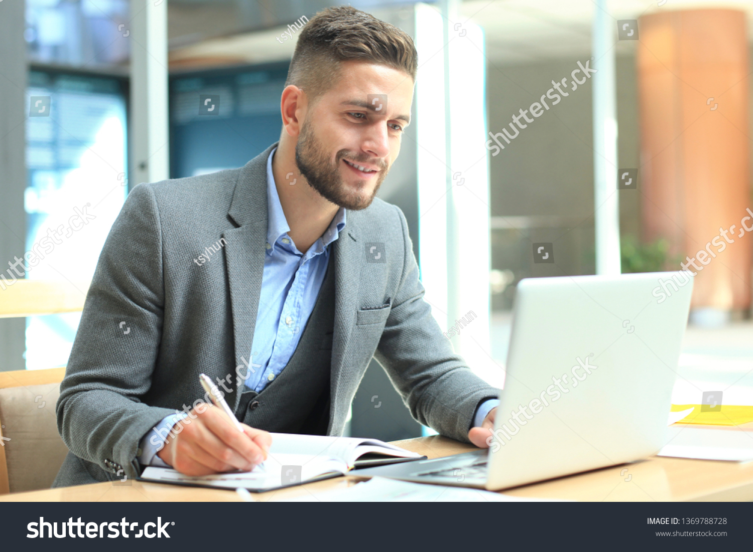 Portrait Young Man Sitting His Desk Stock Photo 1369788728 | Shutterstock