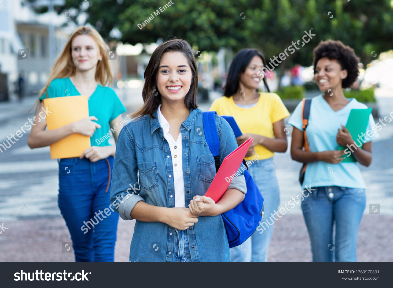 young-spanish-female-student-group-women-stock-photo-1369970831