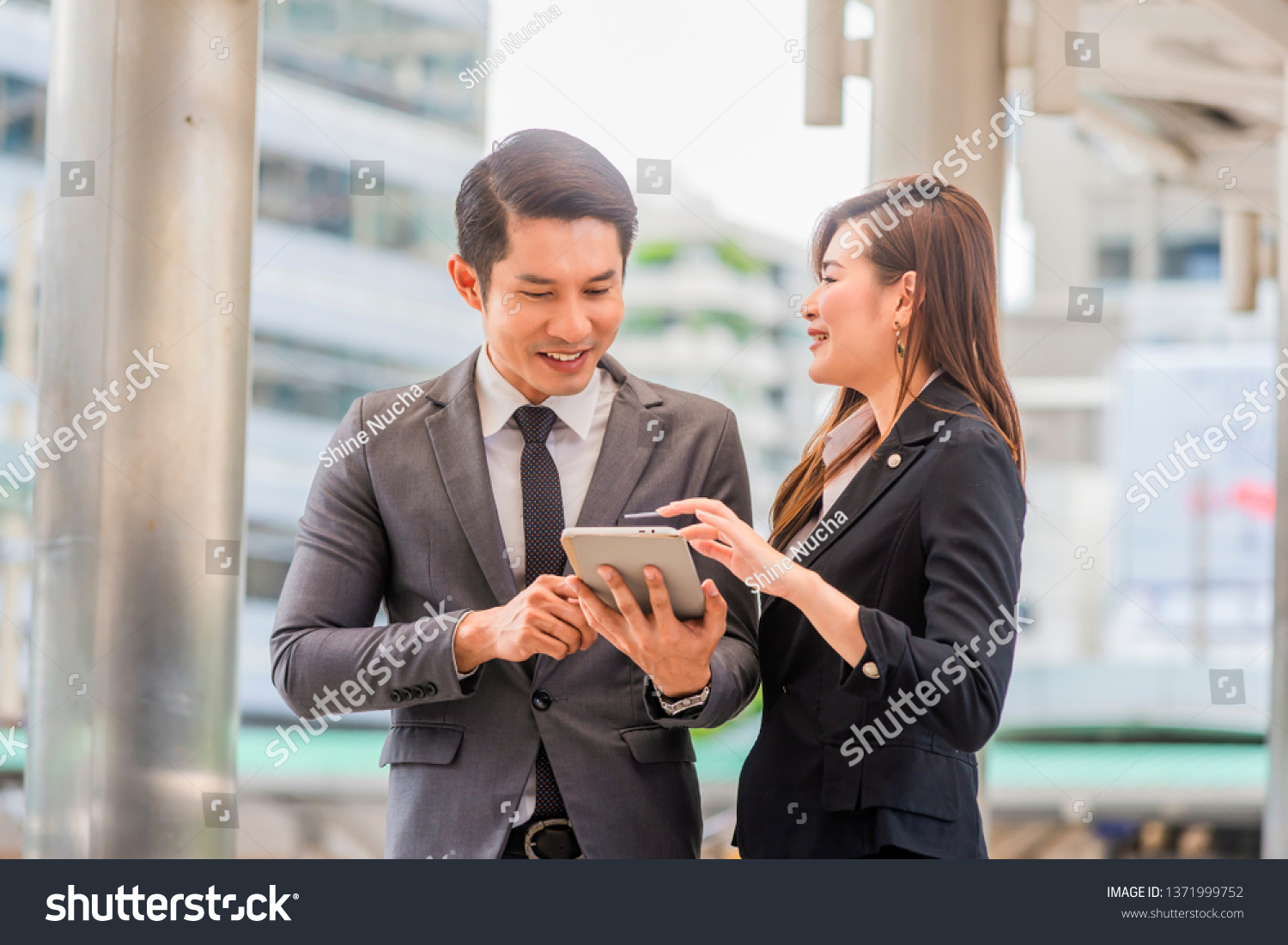 Happy Asian Business People Working Outside Stock Photo 1371999752 ...