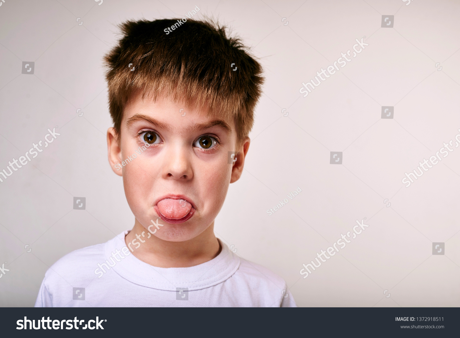 Boy Shows Tongue Stock Photo 1372918511 | Shutterstock