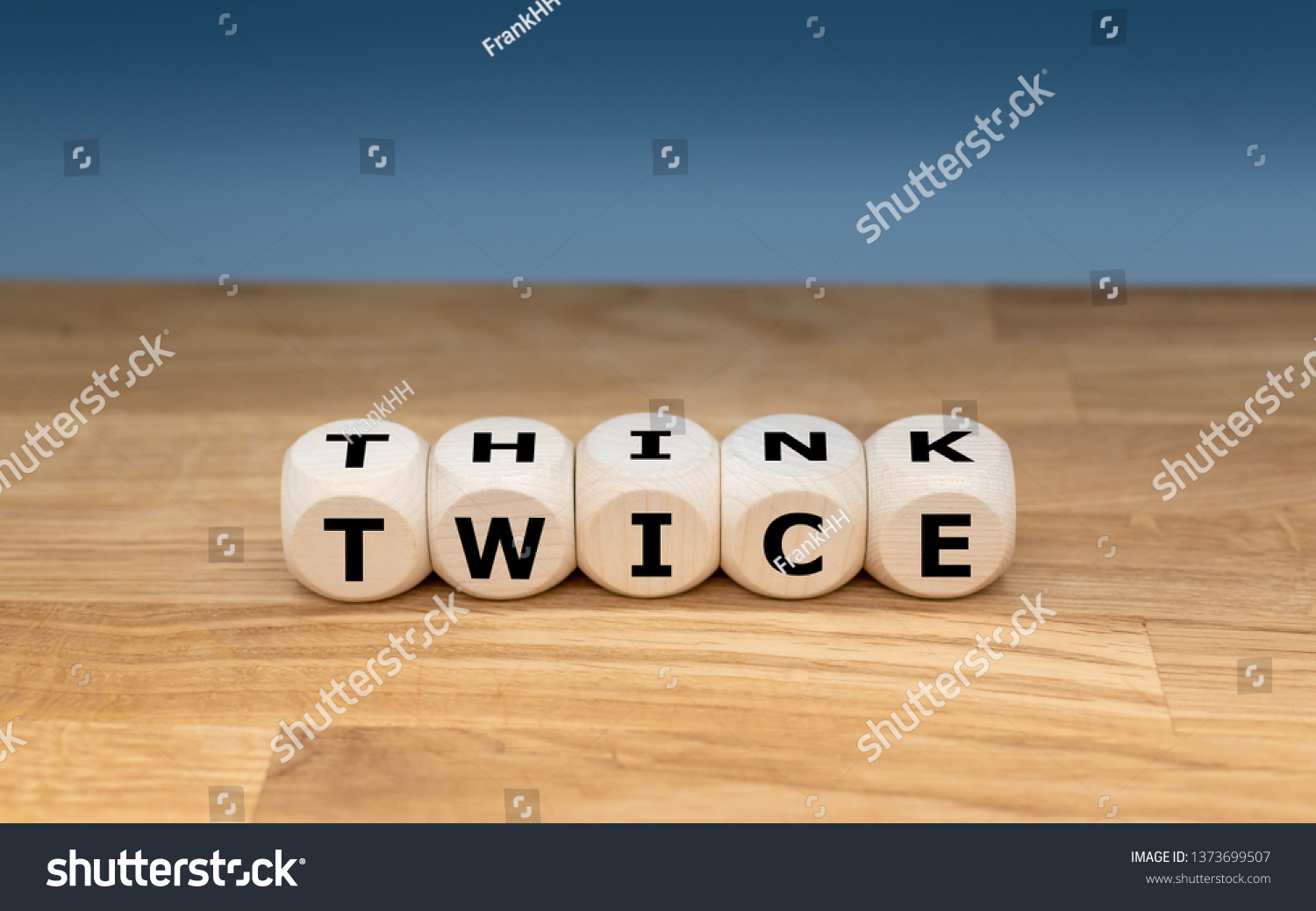 dice-form-words-think-twice-stock-photo-1373699507-shutterstock