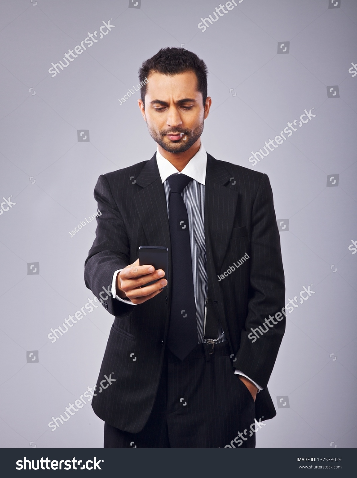 Serious Executive Reading Text Message Stock Photo 137538029 | Shutterstock