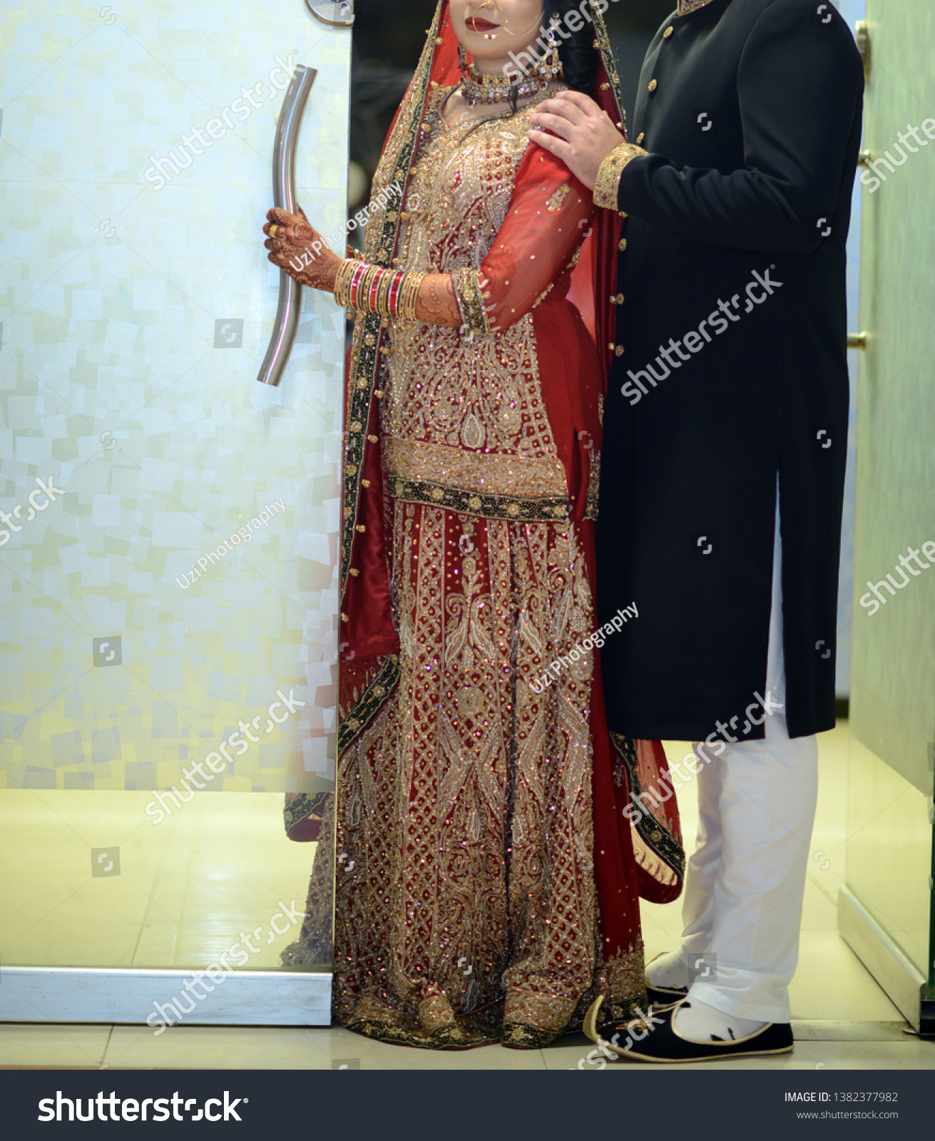 groom black sherwani