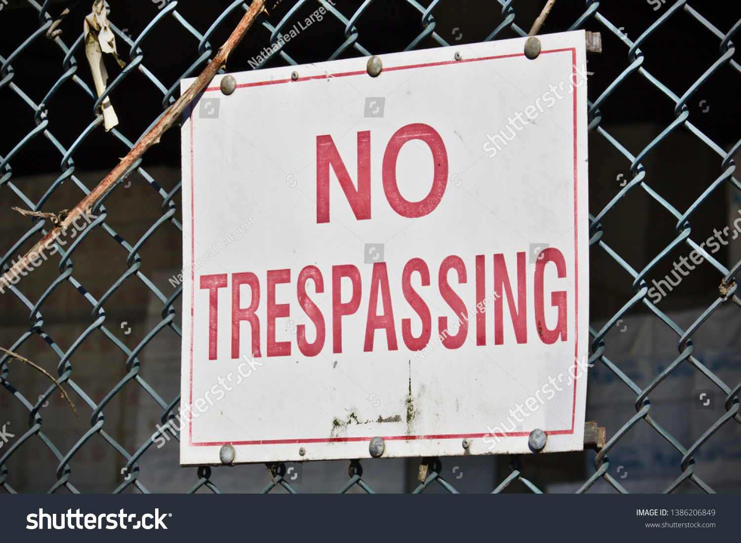 Warning Sign On Chain Link Fence Stock Photo 1386206849 | Shutterstock