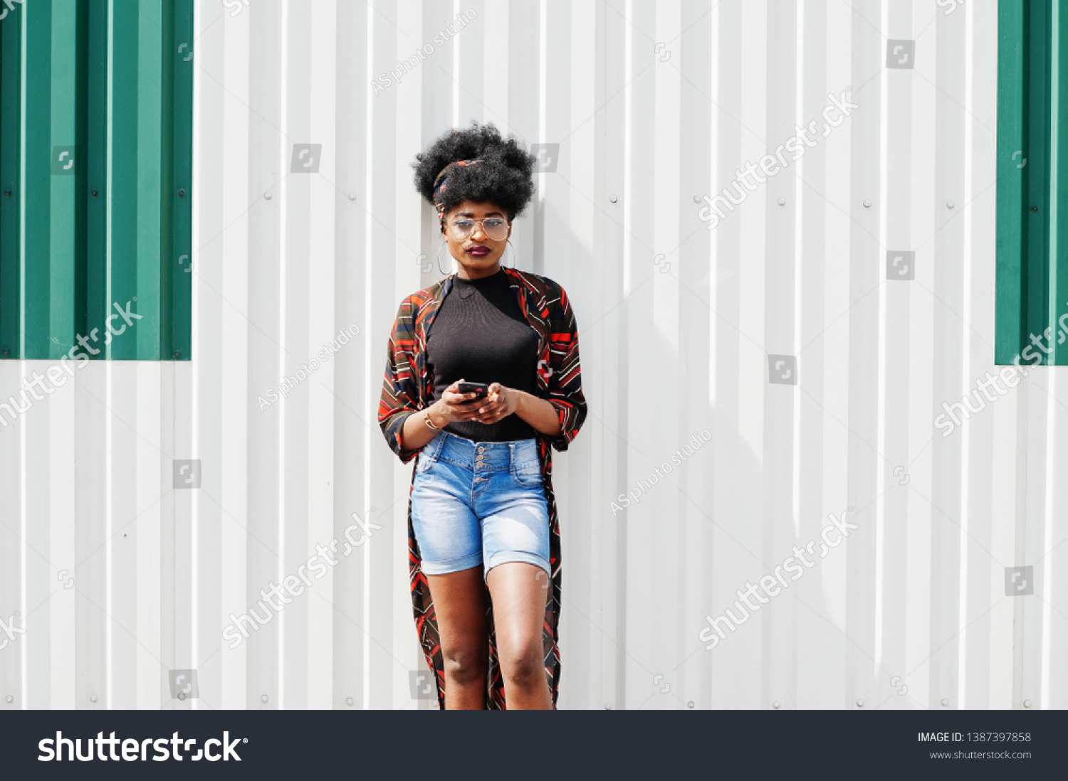 African Woman Afro Hair Jeans Shorts Stock Photo 1387397858 Shutterstock African Woman Afro Hair Jeans Shorts Stock Photo 1387397858 Shutterstock