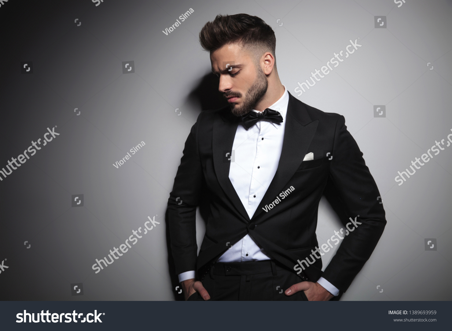 Worried Man Black Tuxedo Holding Hands Stock Photo 1389693959 ...