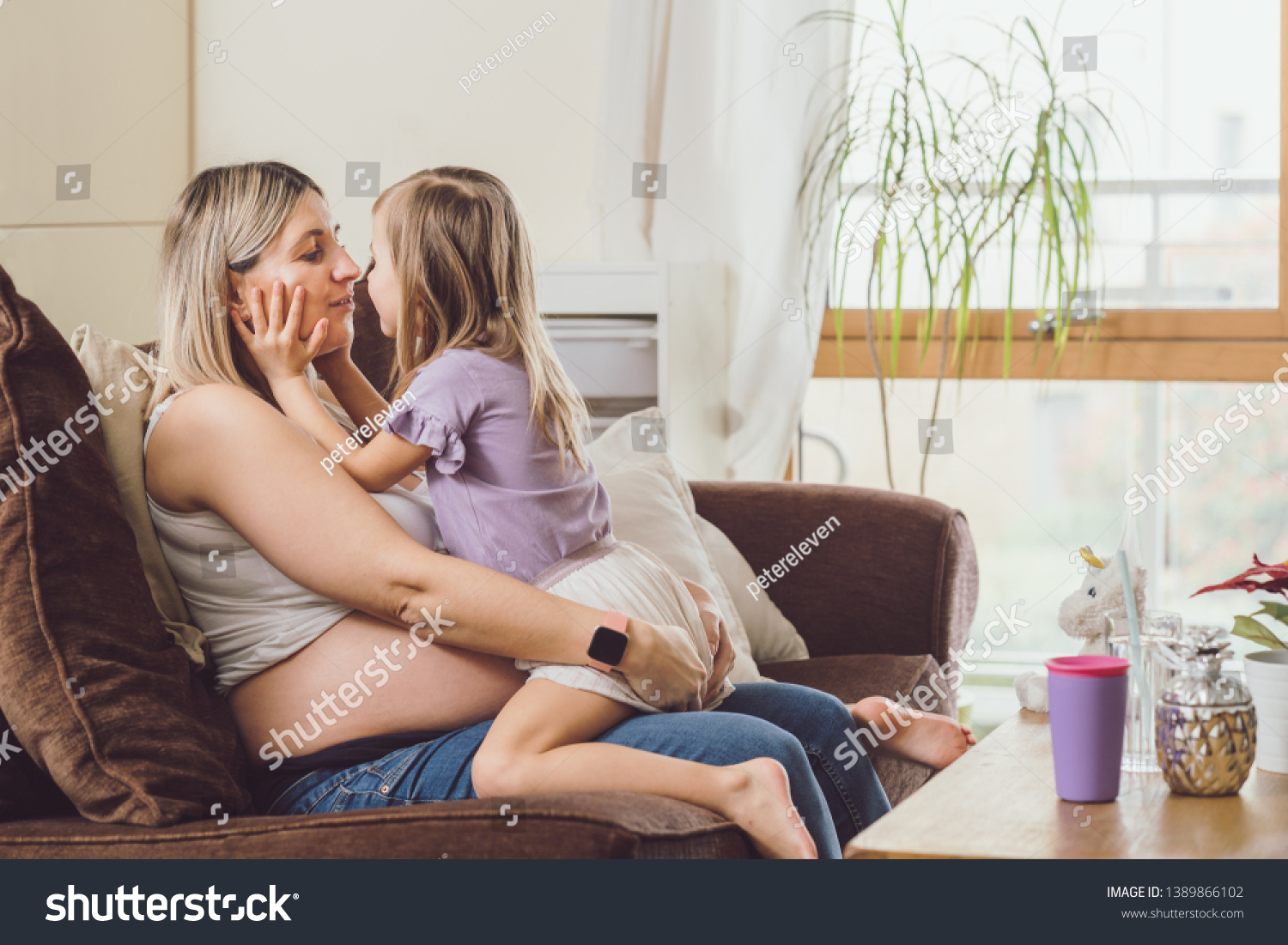 Girls Kissing On Sofa