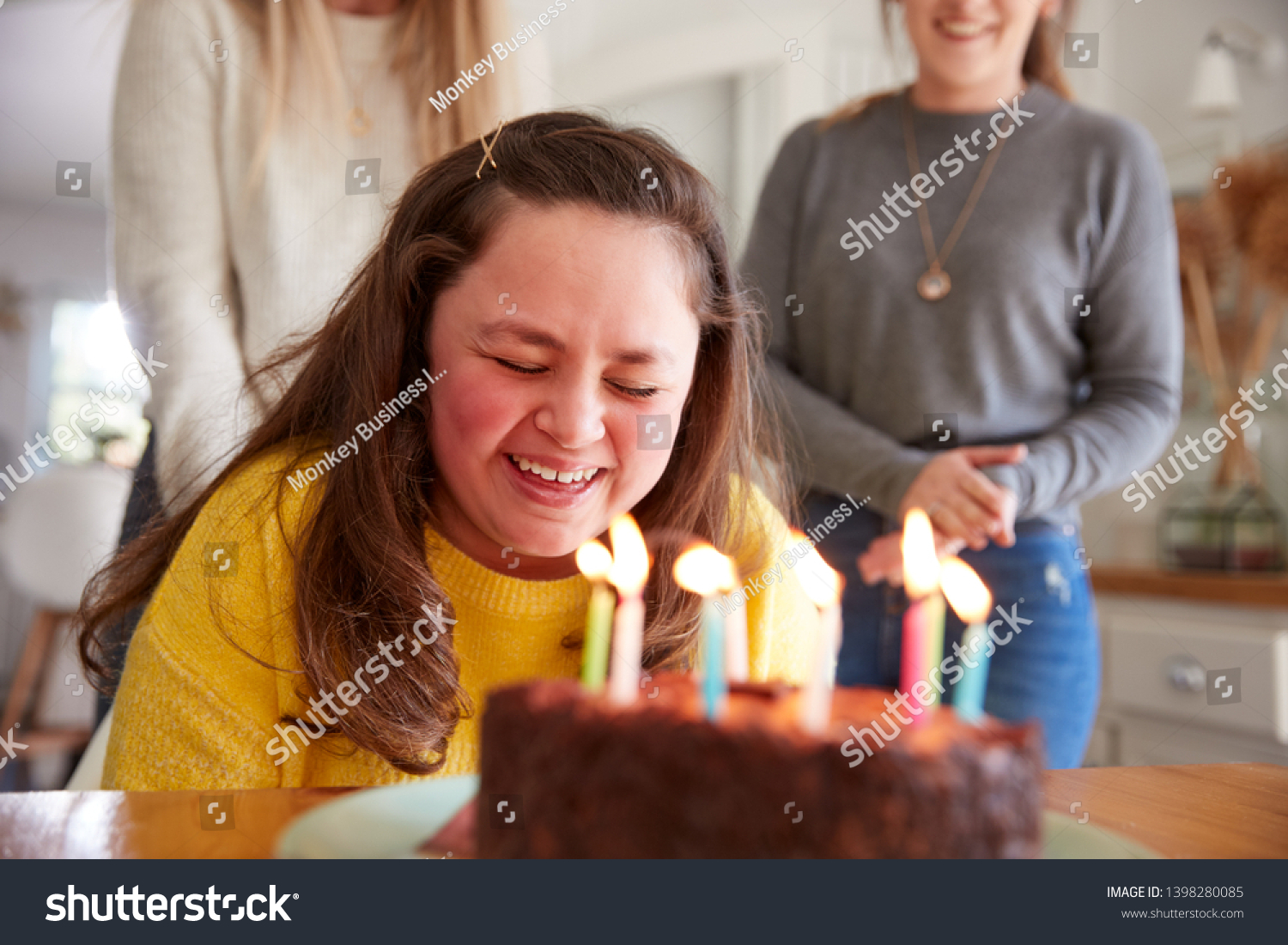 Young Downs Syndrome Woman Celebrating Birthday Stock Photo 1398280085 ...