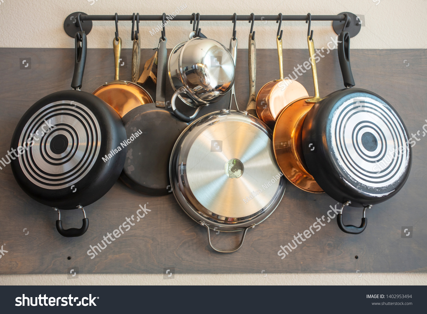 Kitchen Wall Rack Hanging Pots Pans Stock Photo 1402953494 Shutterstock   Stock Photo Kitchen Wall Rack For Hanging Pots Pans Aprons And Other Utensils For Efficient Organization 1402953494 