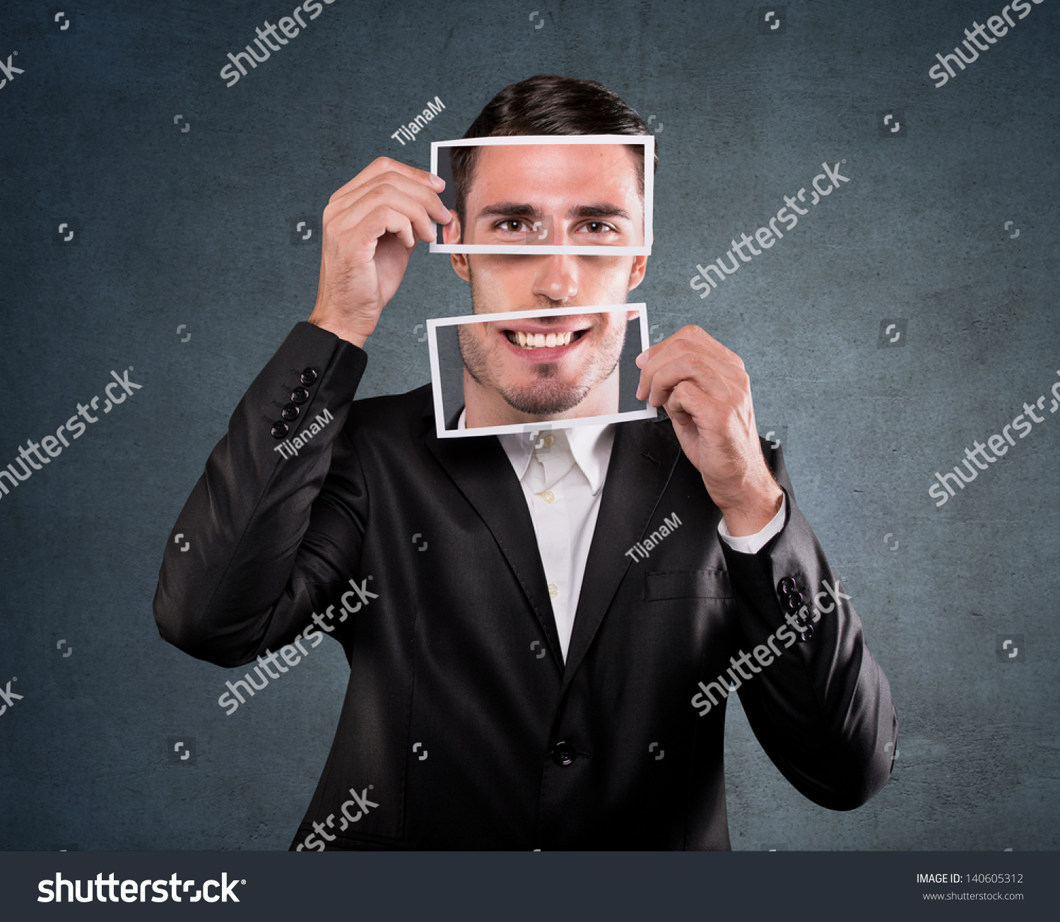 Businessman Holding Smile Over His Face Stock Photo 140605312 ...