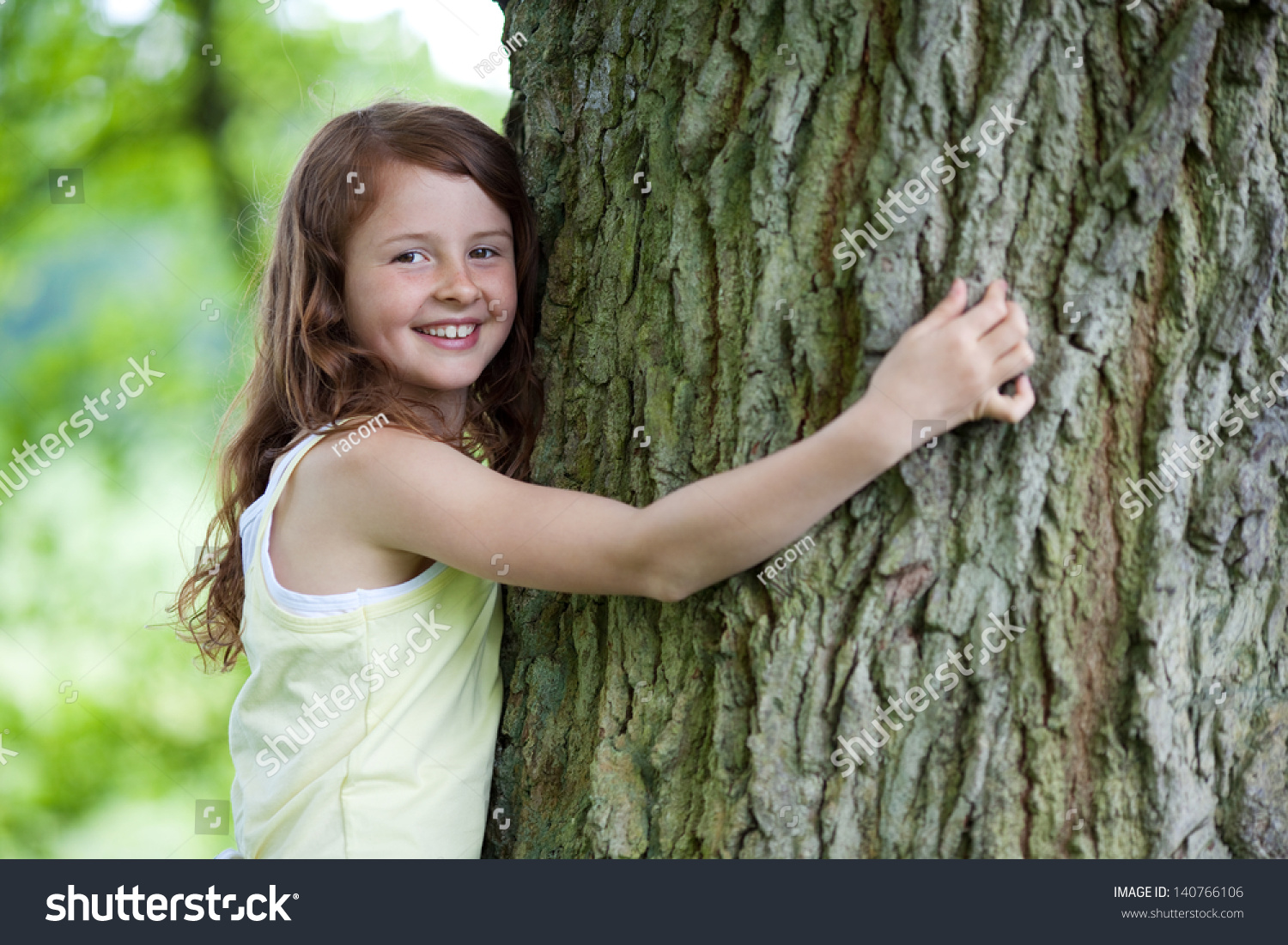 Portrait Happy Preadolescent Girl Embracing Tree Stock Photo 140766106 ...