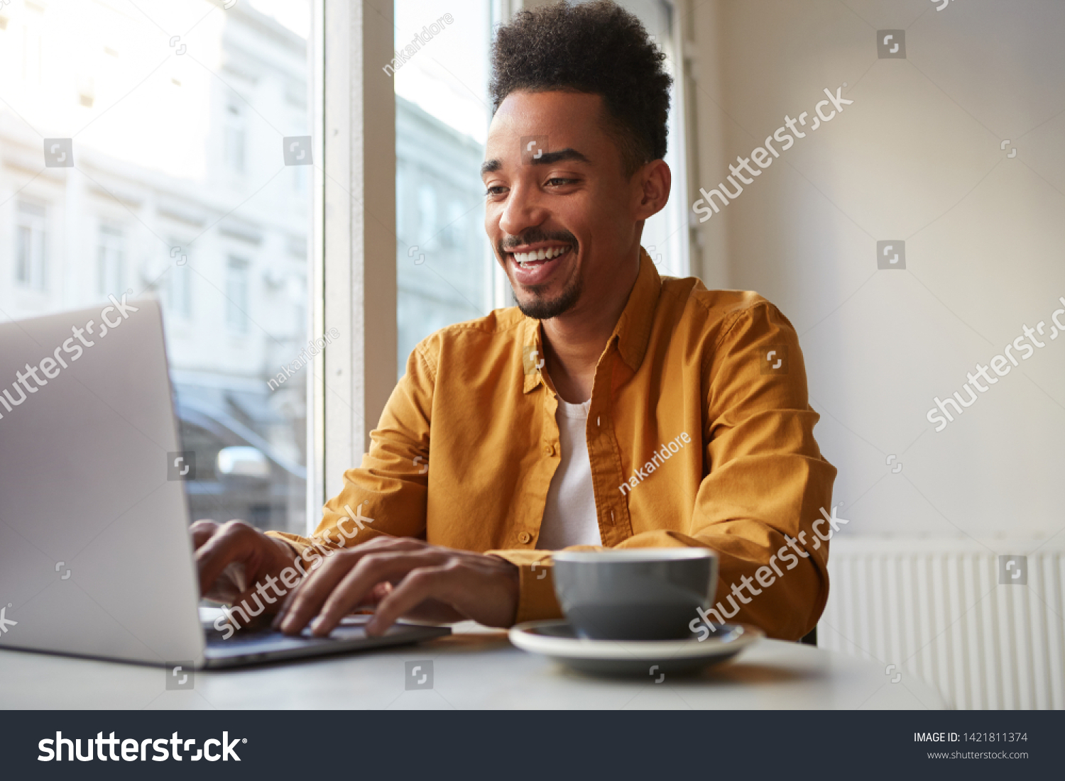 Young African American Man Sitting Table Stock Photo 1421811374 ...