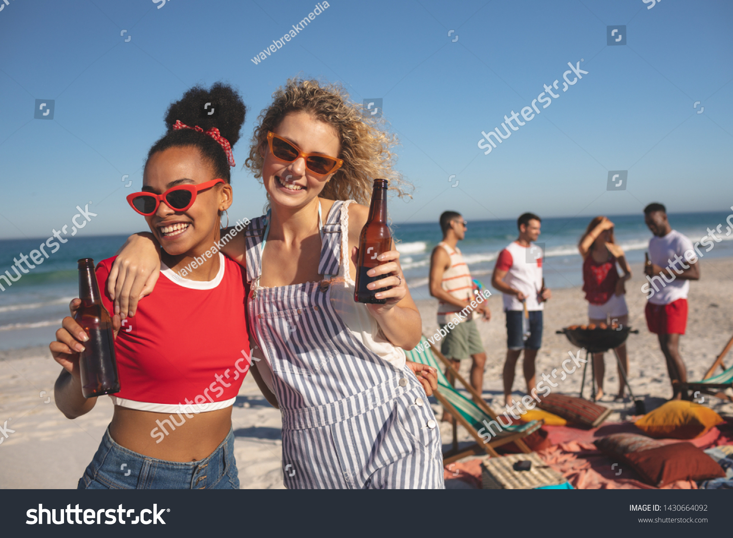 681 Black people holding bottle at the beach Images, Stock Photos ...