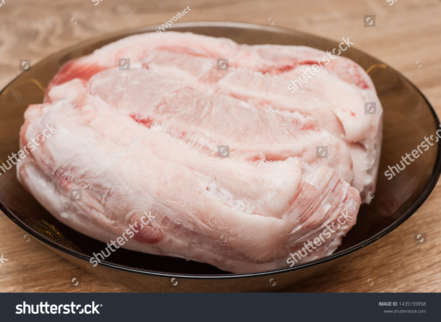 chicken-meat-defrosted-plate-kitchen-before-stock-photo-1435159958