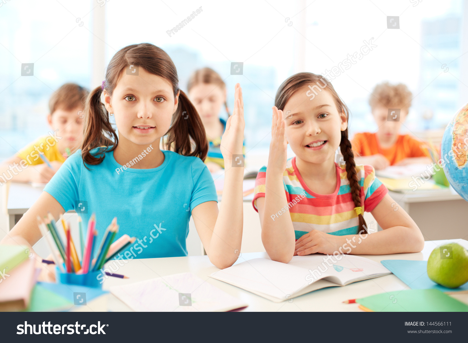 Portrait Two Diligent Girls Raising Hands Stock Photo 144566111 ...