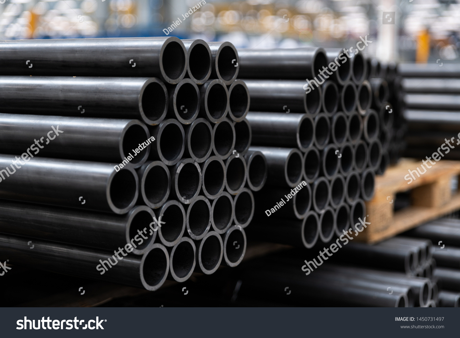 56 387 Black Steel Pipe Images Stock Photos Vectors Shutterstock   Stock Photo Black Steel Pipes On The Stack In The Warehouse 1450731497 