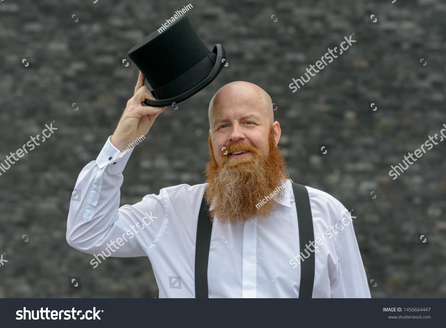 Happy Genial Man Politely Doffing His Stock Photo 1456664447 | Shutterstock