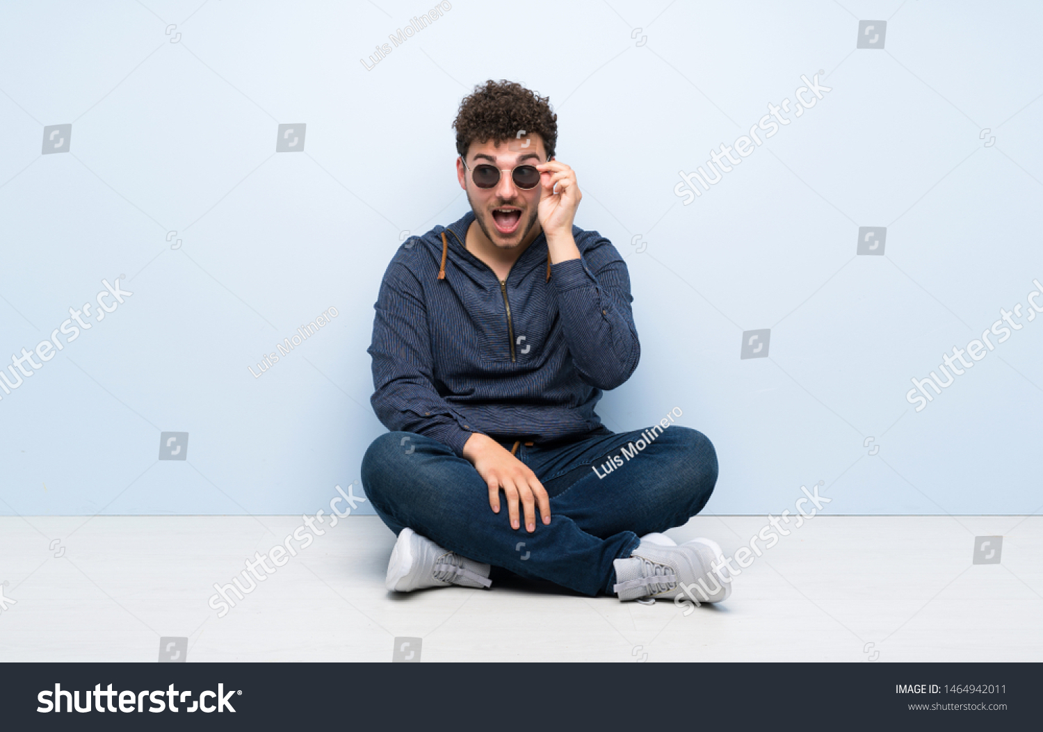 Young Man Sitting On Floor Glasses Stock Photo 1464942011 | Shutterstock