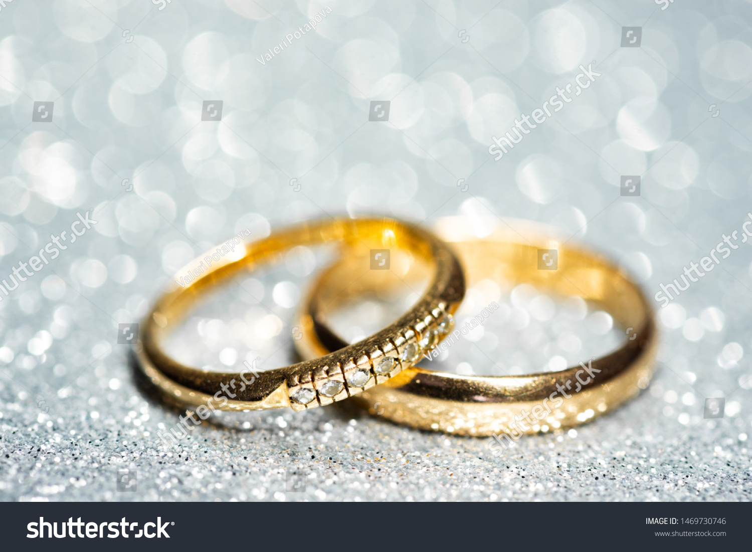 Gold Wedding Rings Glitter Background Stock Photo 1469730746 | Shutterstock