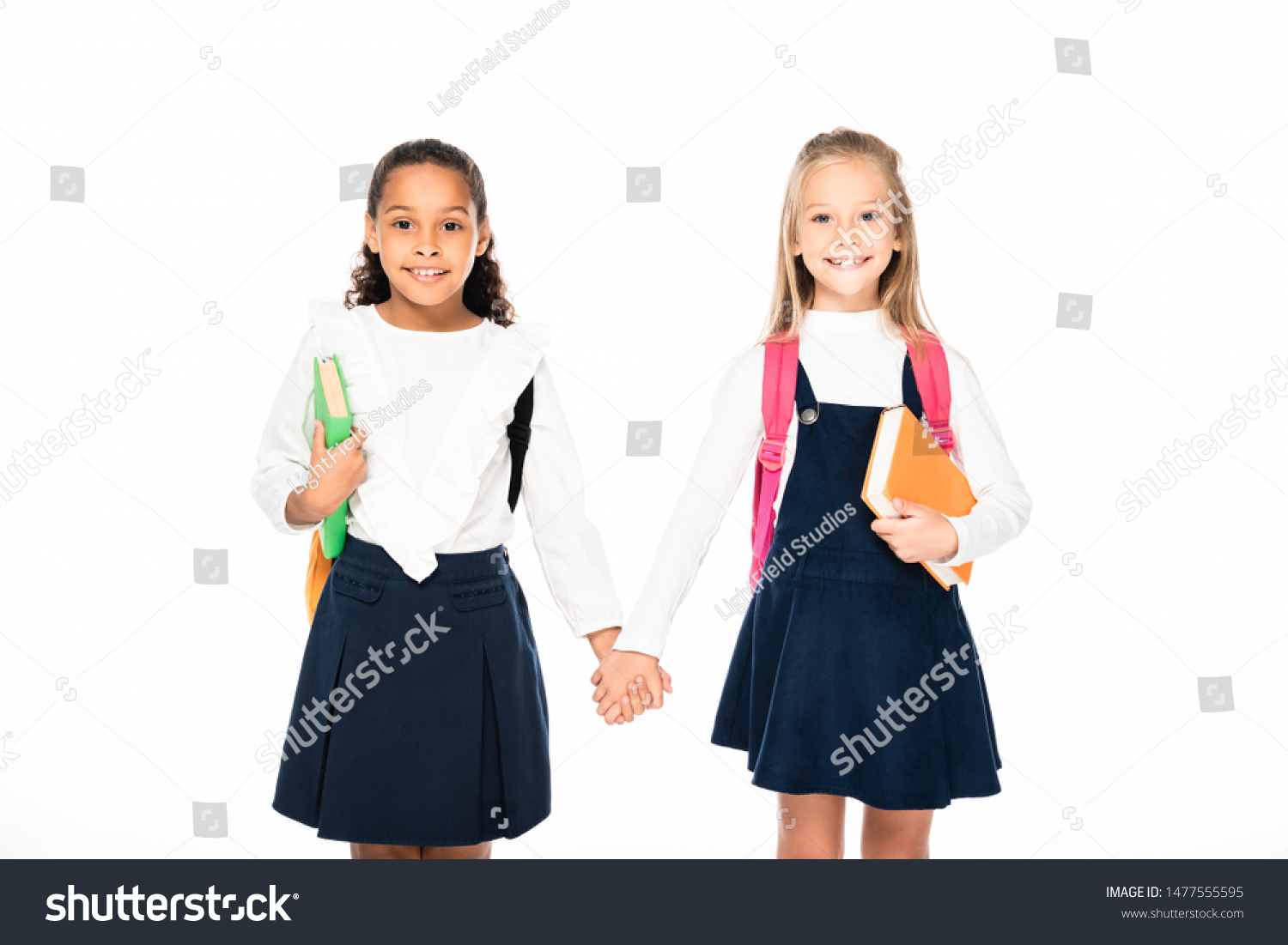 Two Adorable Multicultural Schoolgirls Holding Hands Stock Photo ...