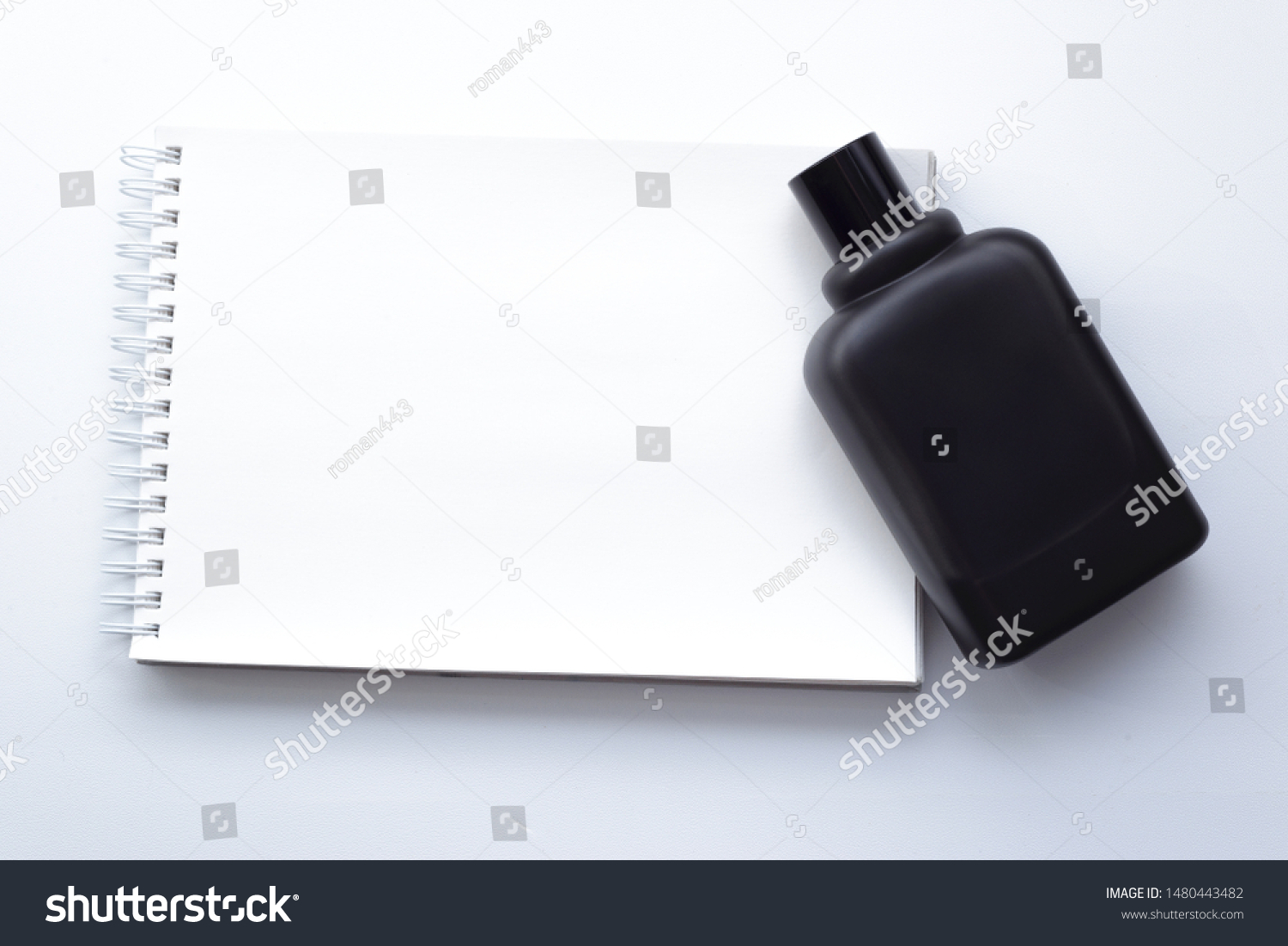 template-notebook-cologne-bottle-stock-photo-1480443482-shutterstock