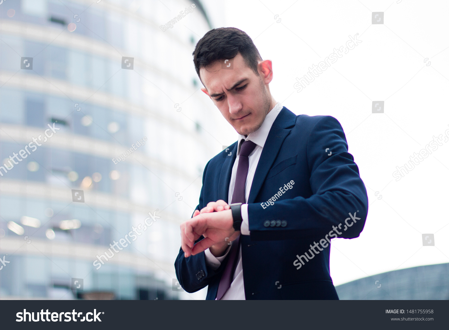 Serious Concentrated Alarmed Young Businessman Looking Stock Photo ...