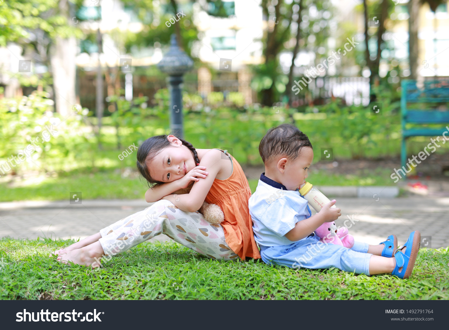 Smiling Little Asian Sister Her Younger Stock Photo 1492791764 ...