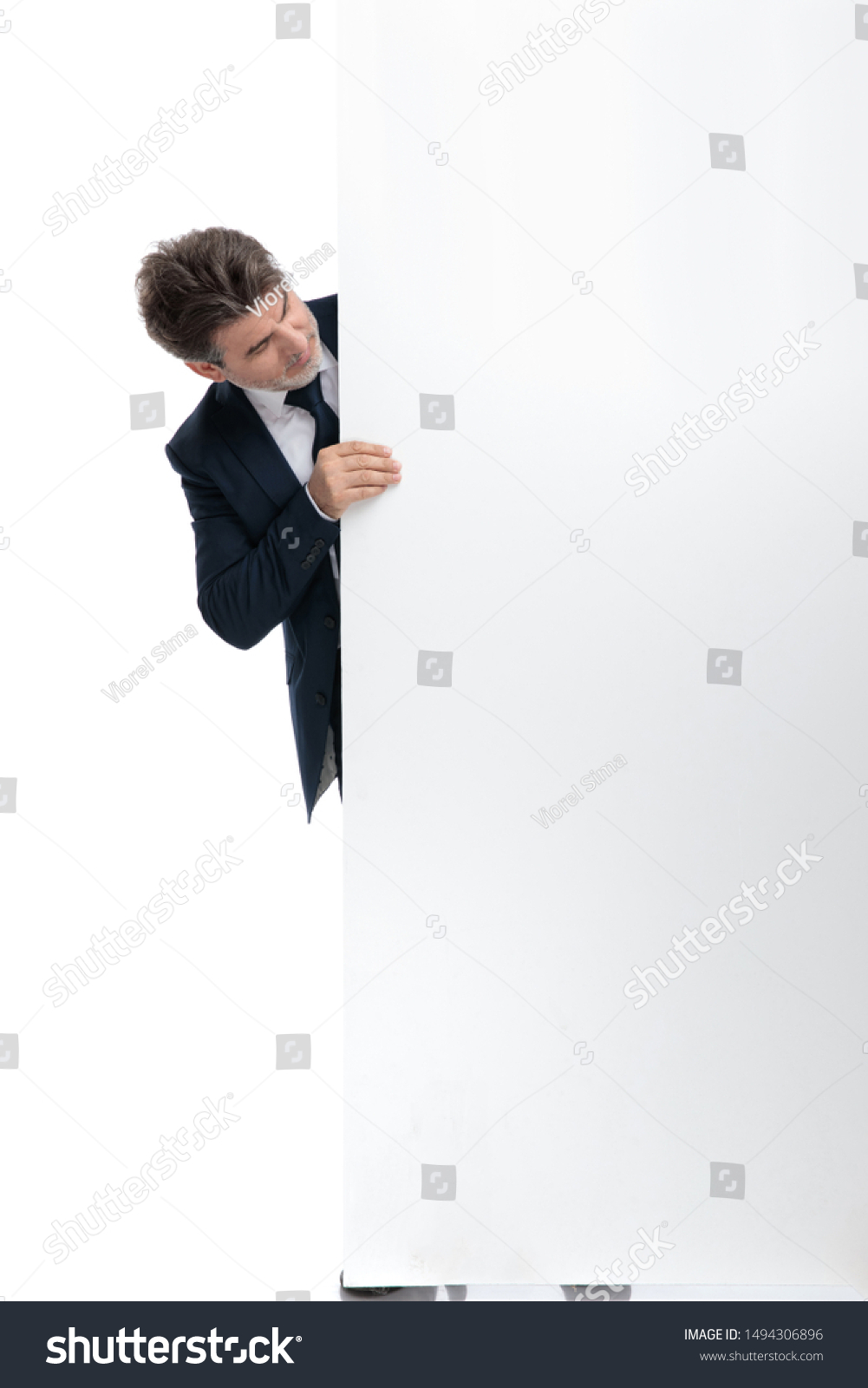 Modern Businessman Holding Empty Billboard Looking Stock Photo ...