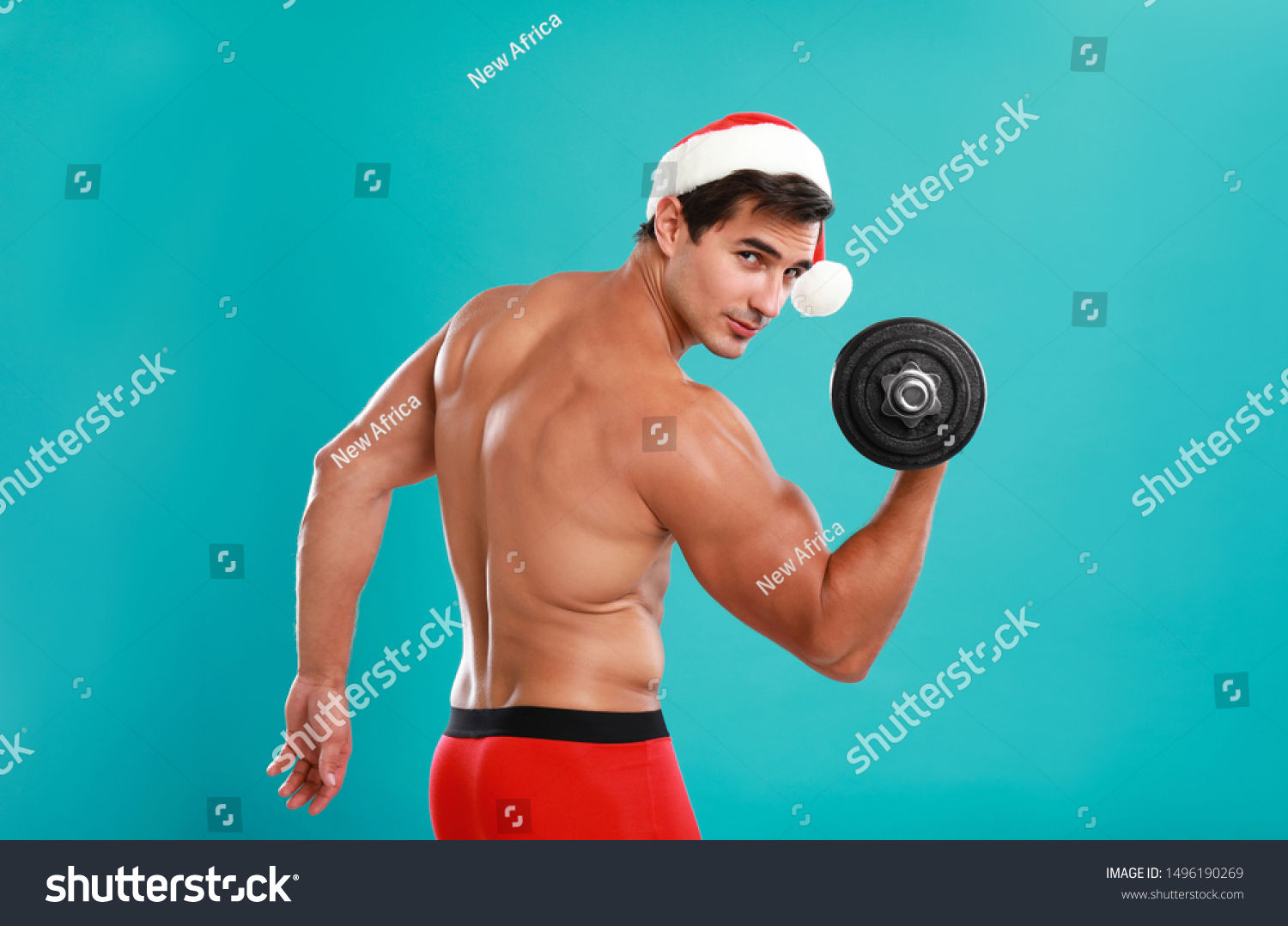 Sexy Shirtless Santa Claus Dumbbell On Shutterstock