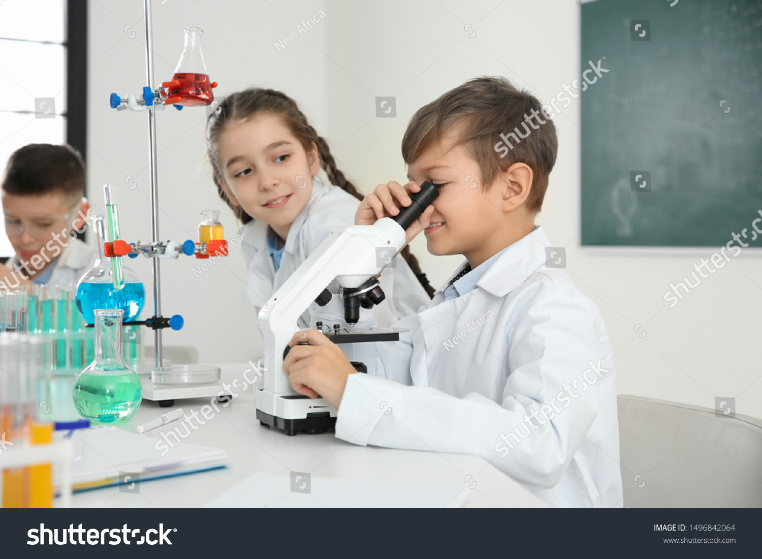 Schoolboy Looking Through Microscope His Classmates Stock Photo ...