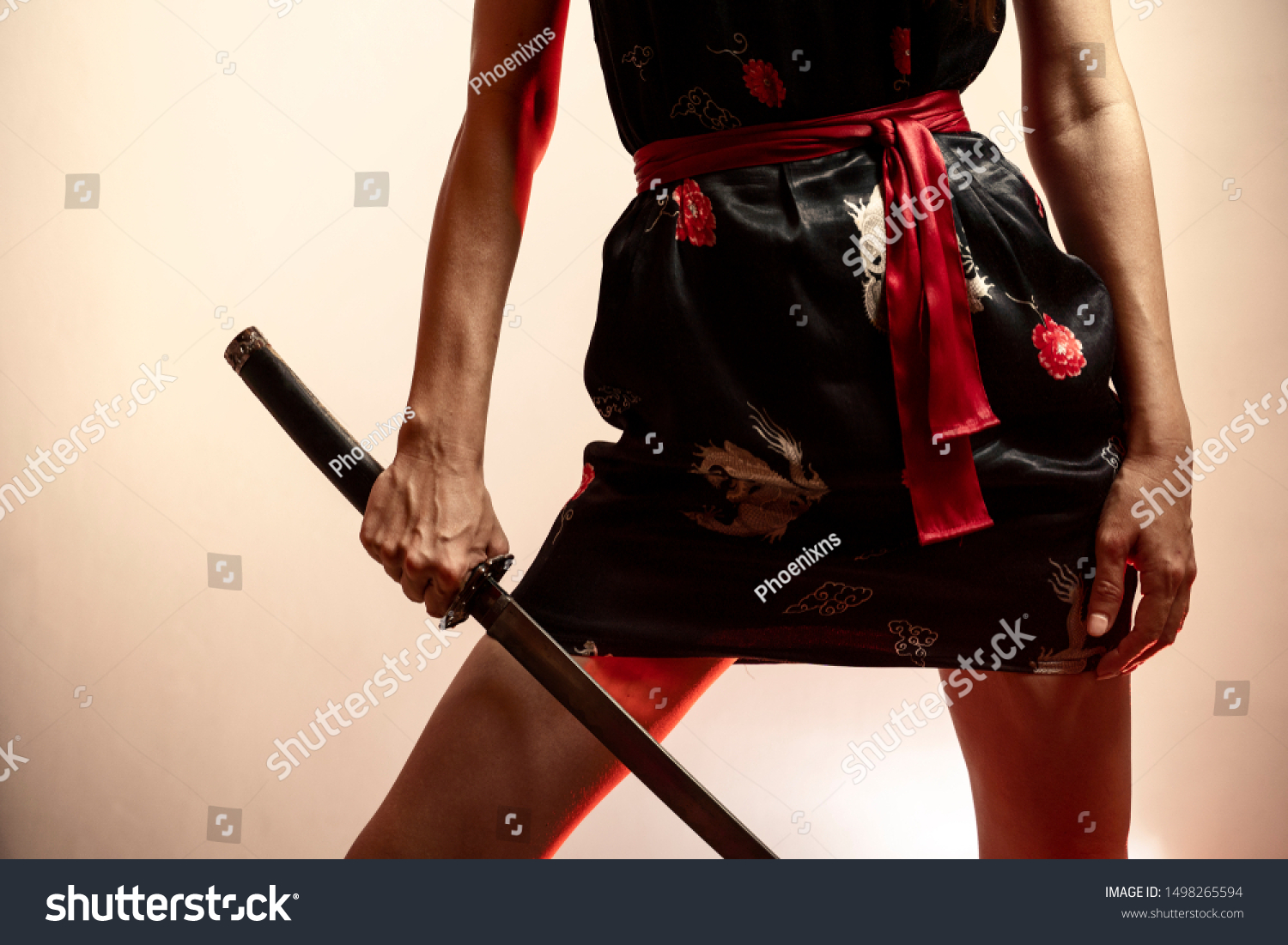 sexy-unrecognizable-female-japanese-dress-holding-stock-photo