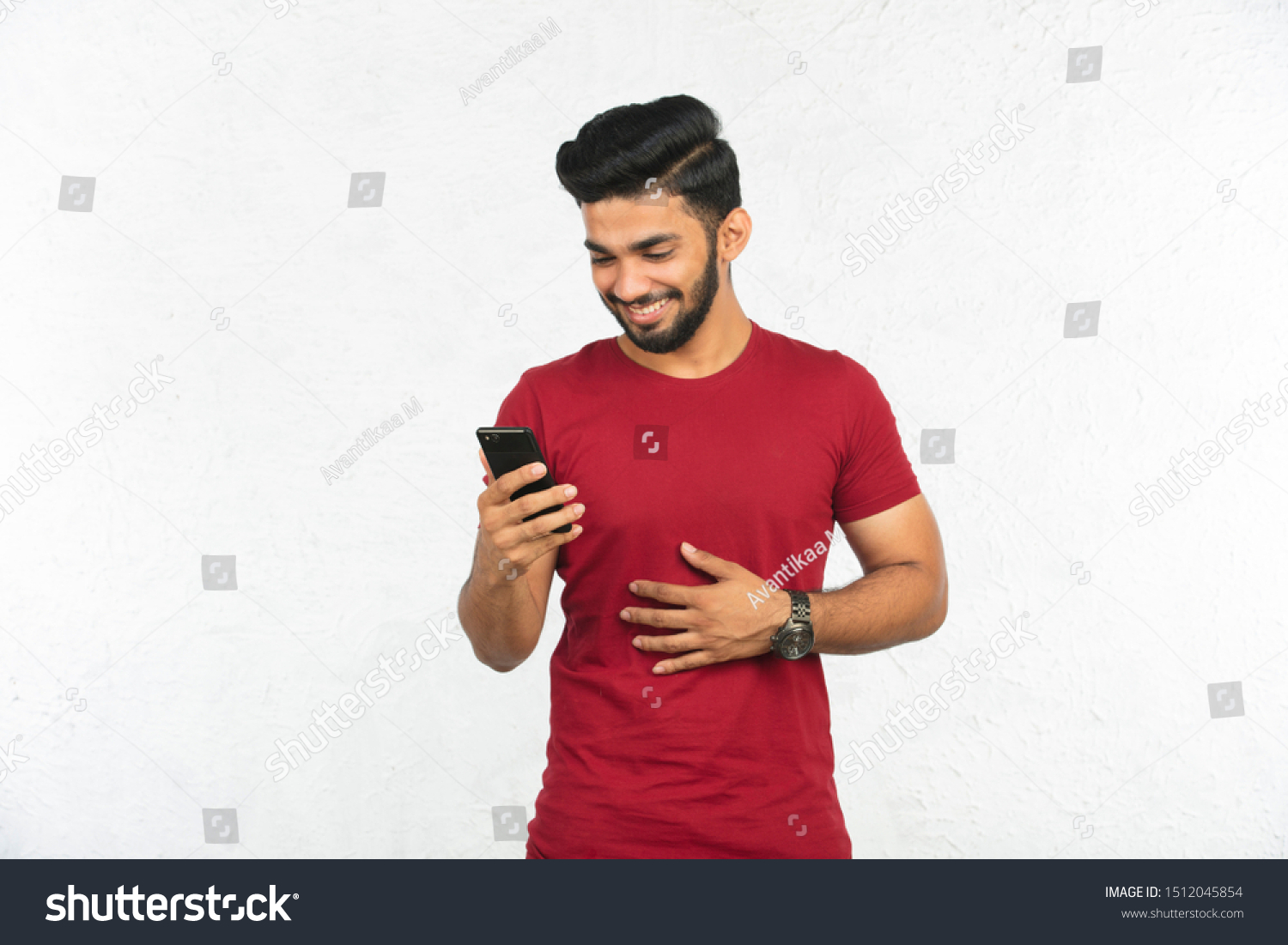 Young Indian Man Holding Phone Smiling Stock Photo 1512045854 ...