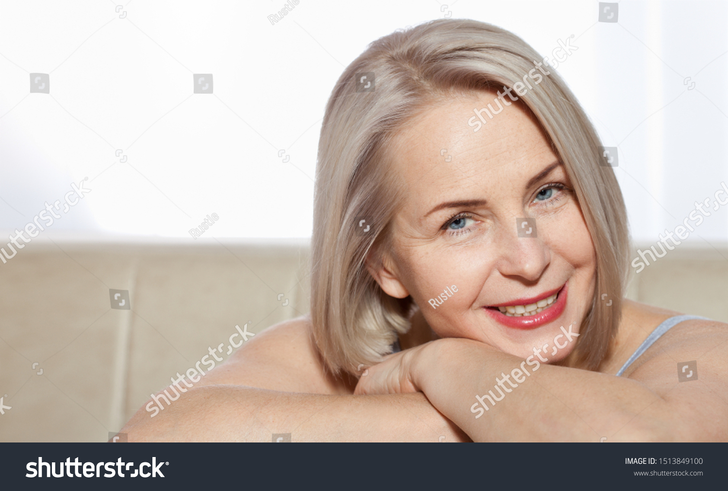 fifty-year-old-woman-very-pleased-stock-photo-1513849100-shutterstock