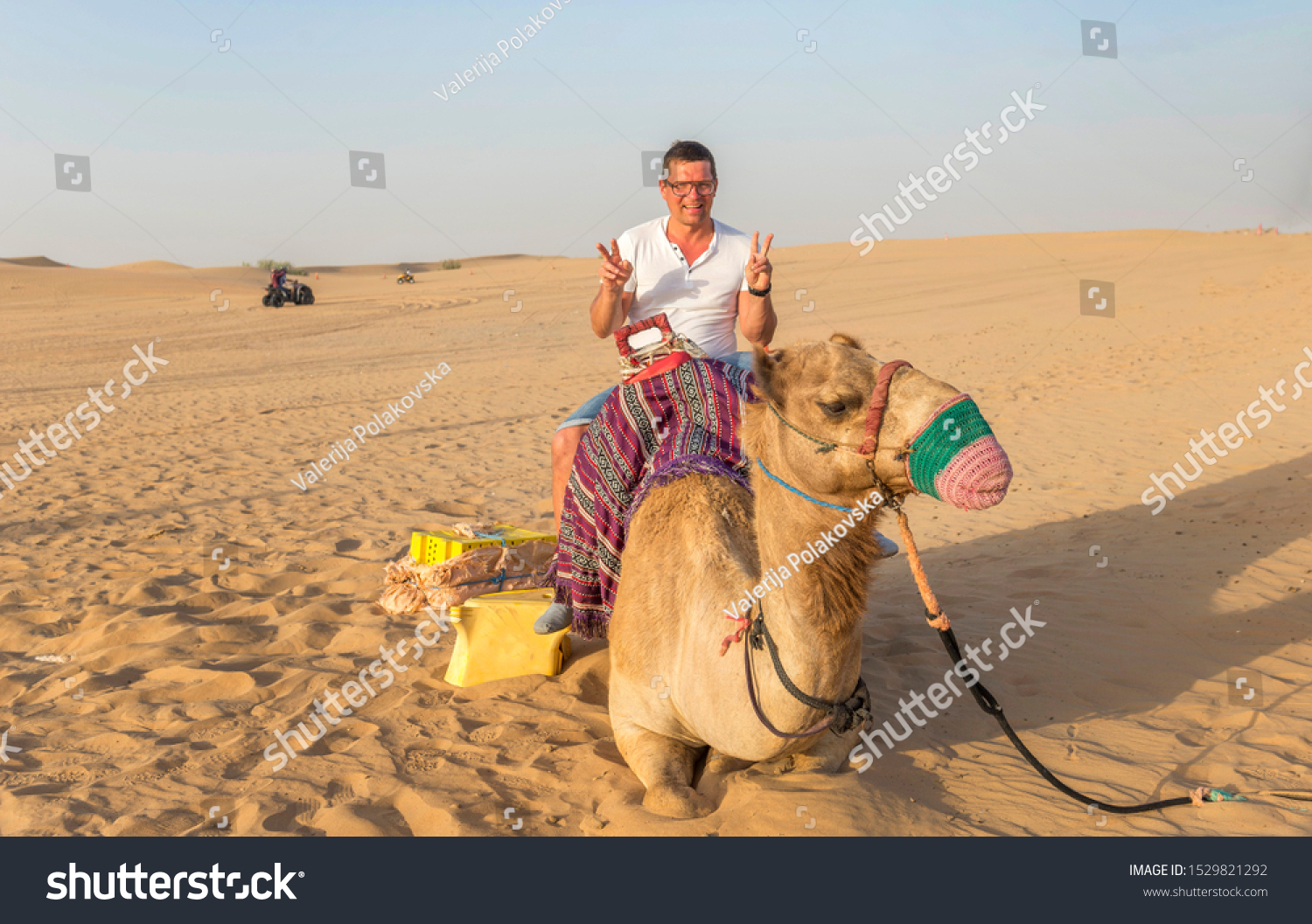 man travel on camel