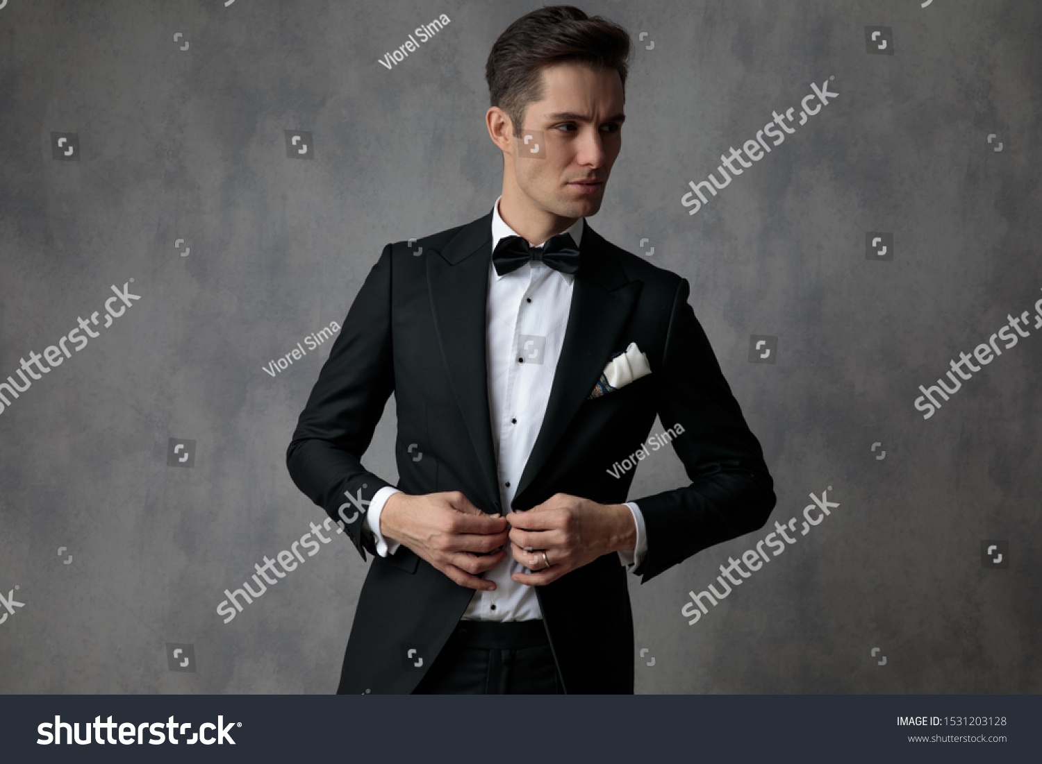 Young Elegant Man Wearing Tuxedo Looking Stock Photo 1531203128 ...