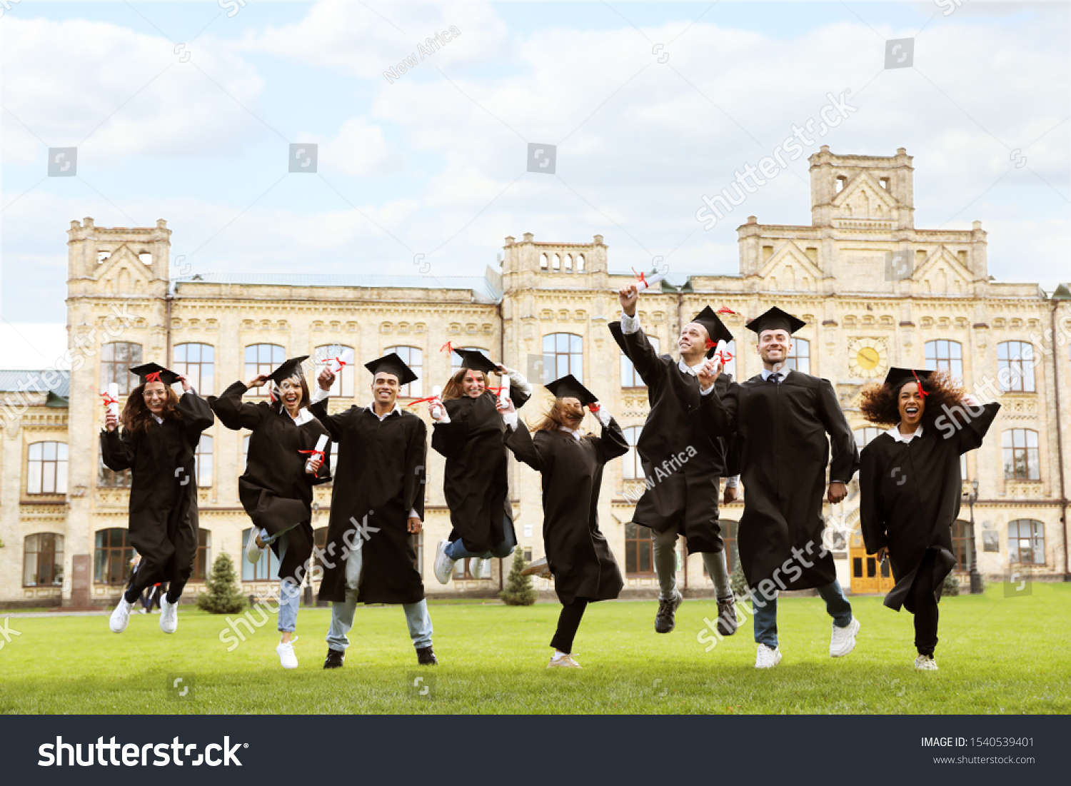 Happy Students Diplomas Outdoors Graduation Ceremony Stock Photo