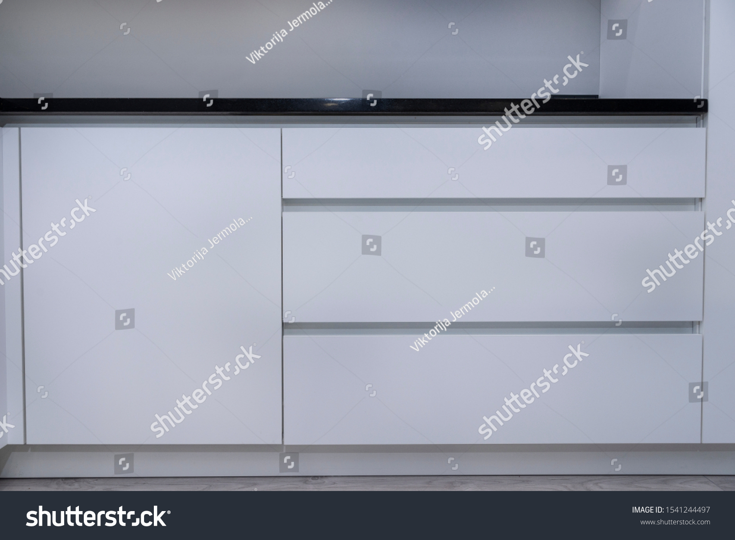 stock-photo-modern-black-and-white-kitchen-design-1541244497.jpg