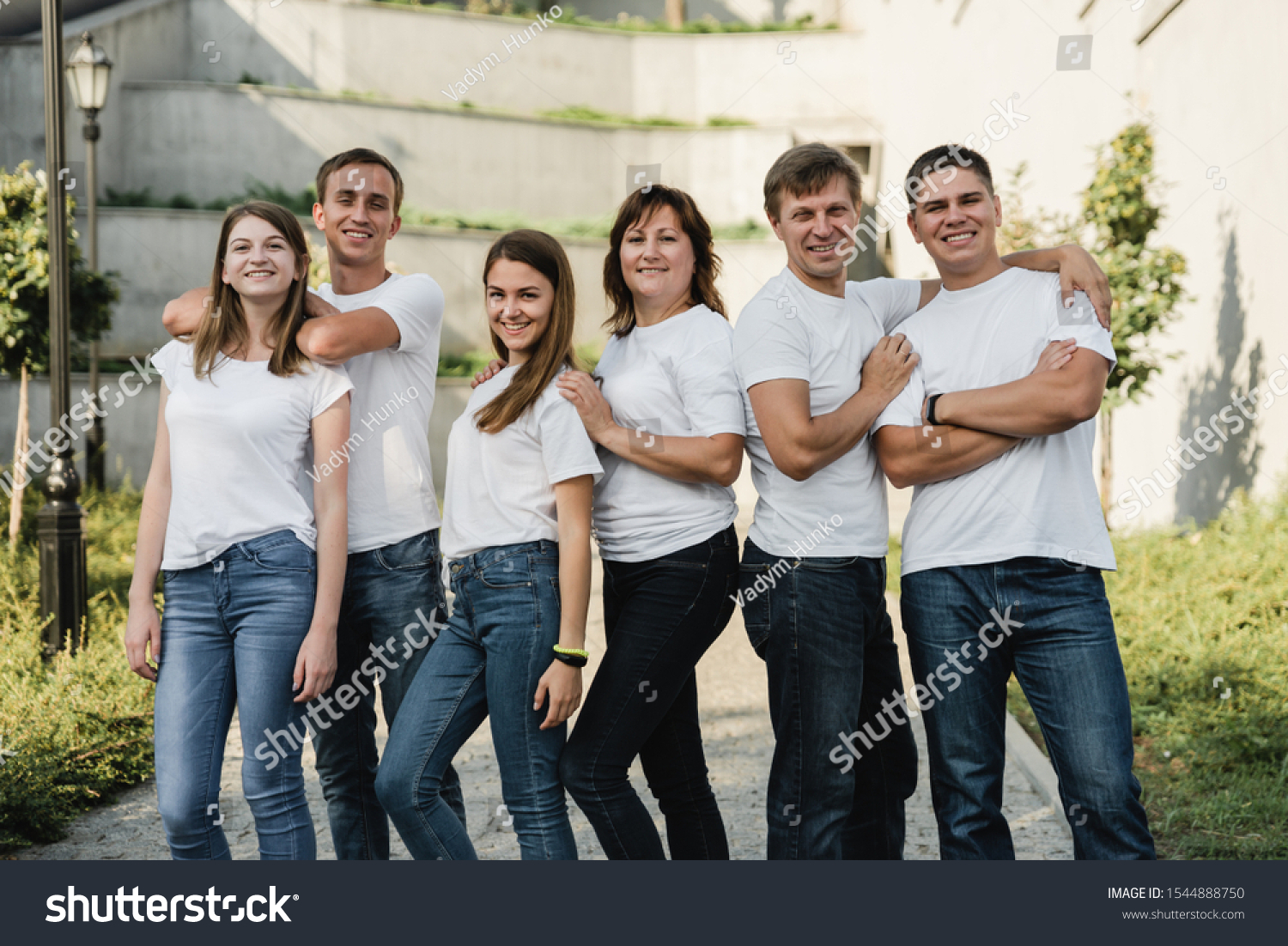 Happy Family White Tshirt Jeans Emracing Stock Photo 1544888750