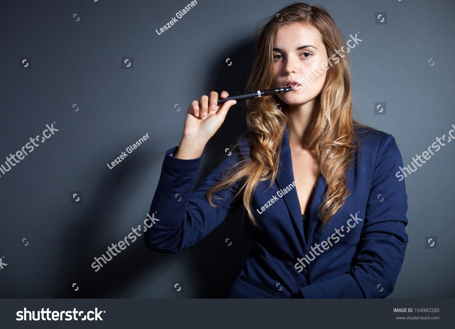 Elegant Woman Smoking Ecigarette Wearing Suit Stock Photo 154987280 ...